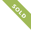 a light green trapezium at a 45 degree angle with sold written across the shape, to be used as a sold flag for property thumbnails
