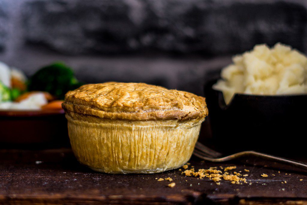 A generic pie with mashed potatoes and vegetables