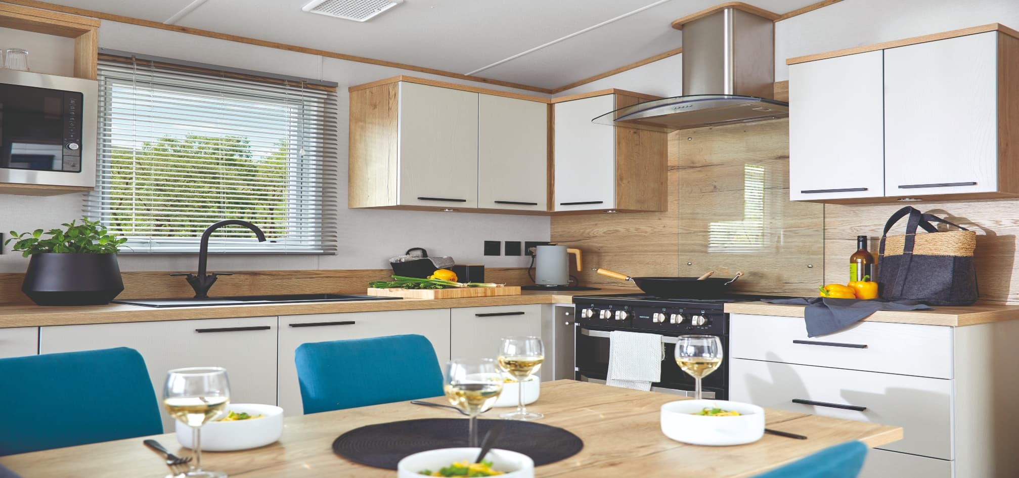 spacious kitchen and living room in a caravan